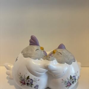 Twee kippen met kuiken